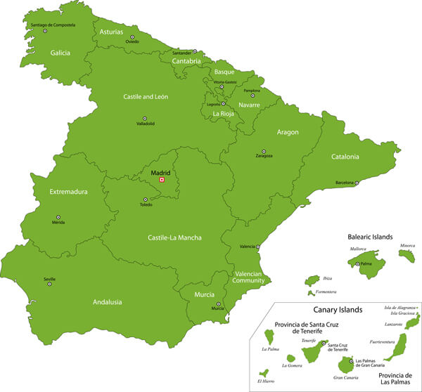 Green map of Spain's regions, with Balearic and Canary Islands shown.